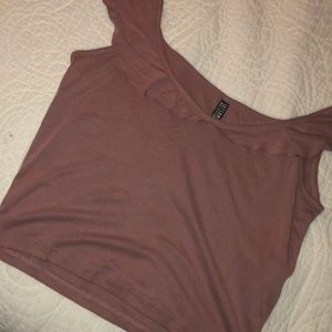 A off the shoulder crop top in a dusty purple/pink